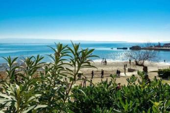 7. Visit Bacvice Beach in Split and play the traditional ball game picigin 